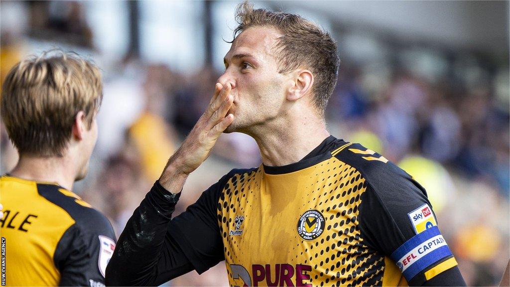 Mickey Demetriou of Newport County celebrates scoring his sides second goal