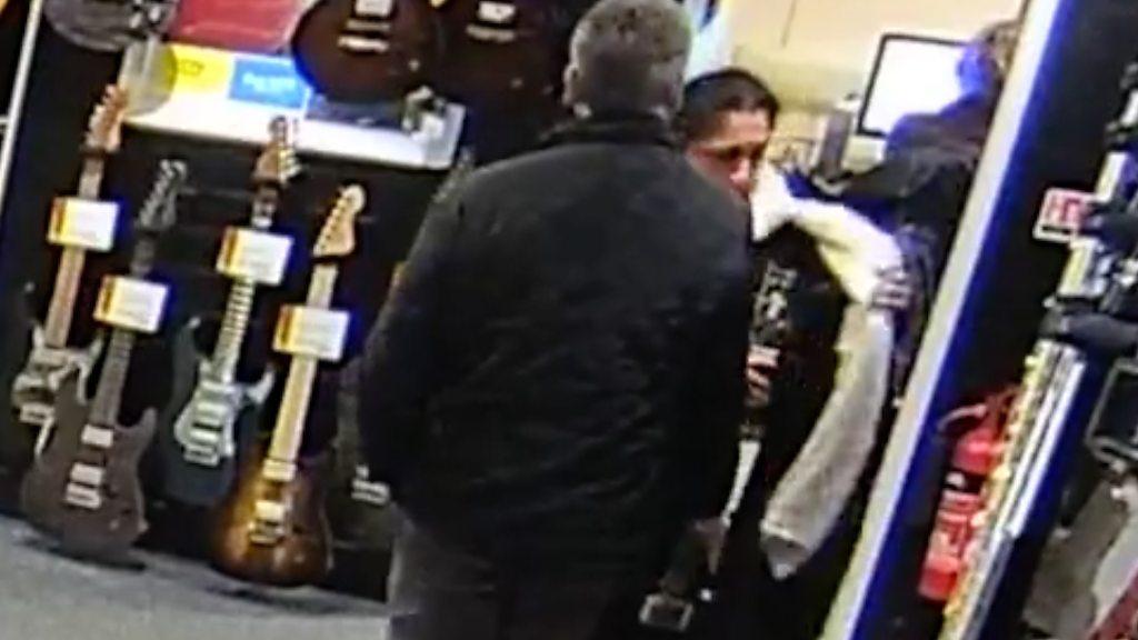 Police want to trace couple after guitar theft