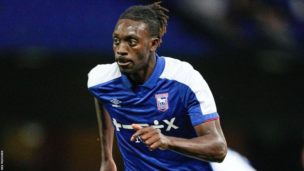 Freddie Ladapo running on the pitch for Ipswich