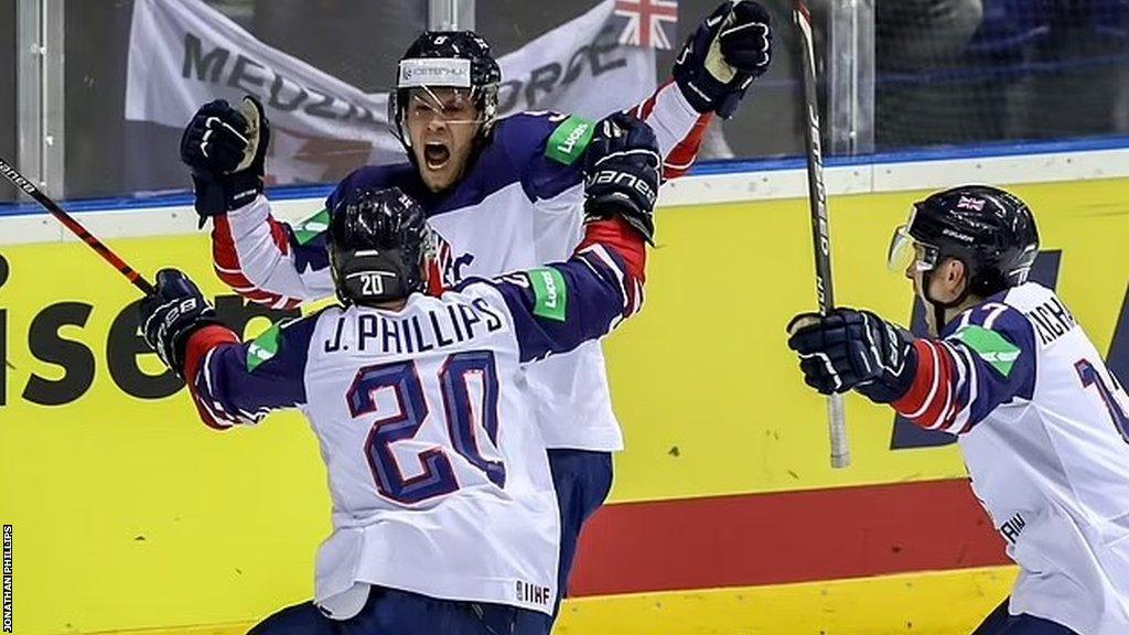 Jonathan Phillips celebrates with his team mates