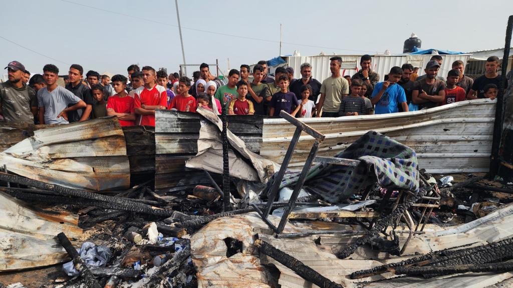 Palestinians view the destruction after Israel bombs their tents and shelters in Rafah, Gaza on May 27, 2024