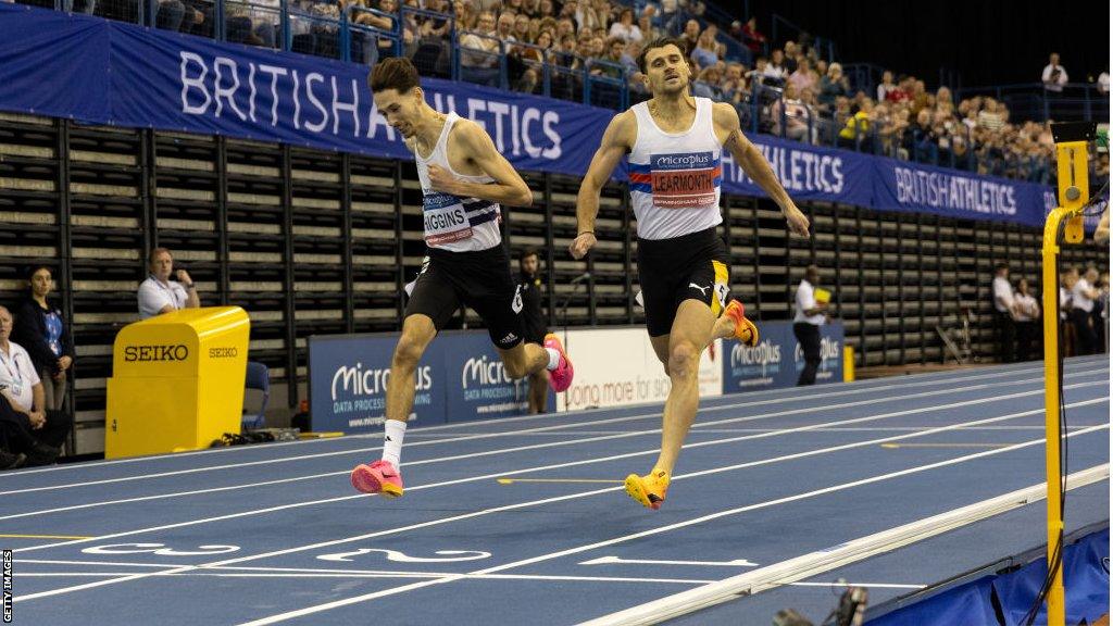 Jack Higgins of Great Britain and Guy Learmonth of Great Britain cross the finish line in the Mens 800m Final during day two of the 2024 UK Athletics Indoor Championships at Utilita Arena Birmingham on February 18, 2024 in Birmingham, England