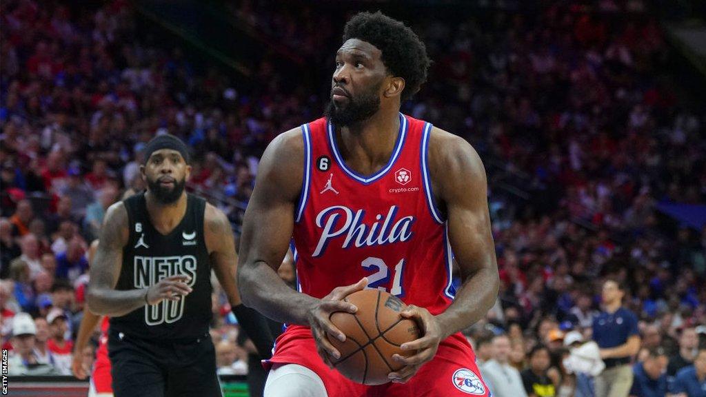 Joel Embiid controls the ball against the Brooklyn Nets during Game One of the Eastern Conference First Round Playoffs