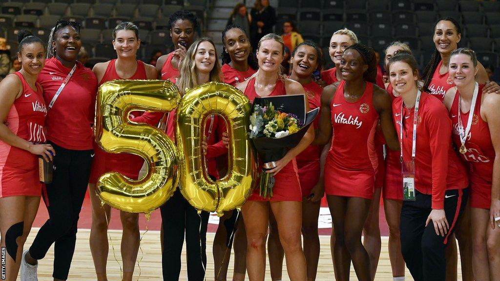 England players with Chelsea Pitman celebrating her 50th England cap