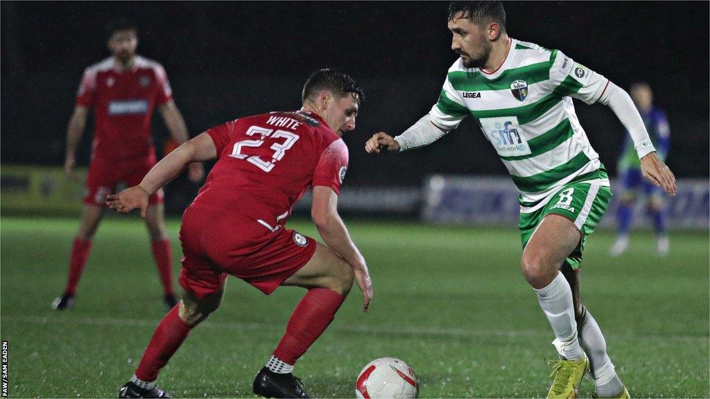 Saints goalscorer Ryan Brobbel in action against Bala's Ross White