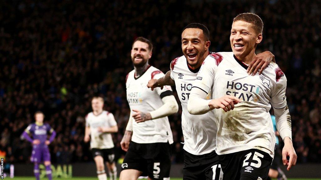 Dwight Gayle celebrates scoring for Derby