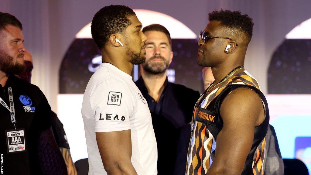 Anthony Joshua faces off with Francis Ngannou