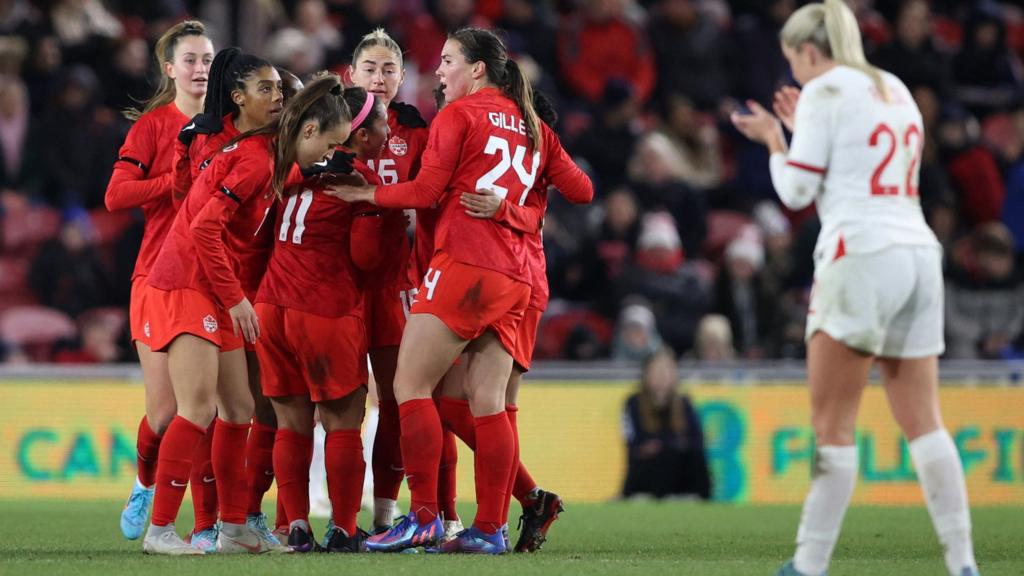 Canada's Janine Beckie celebrates scoring