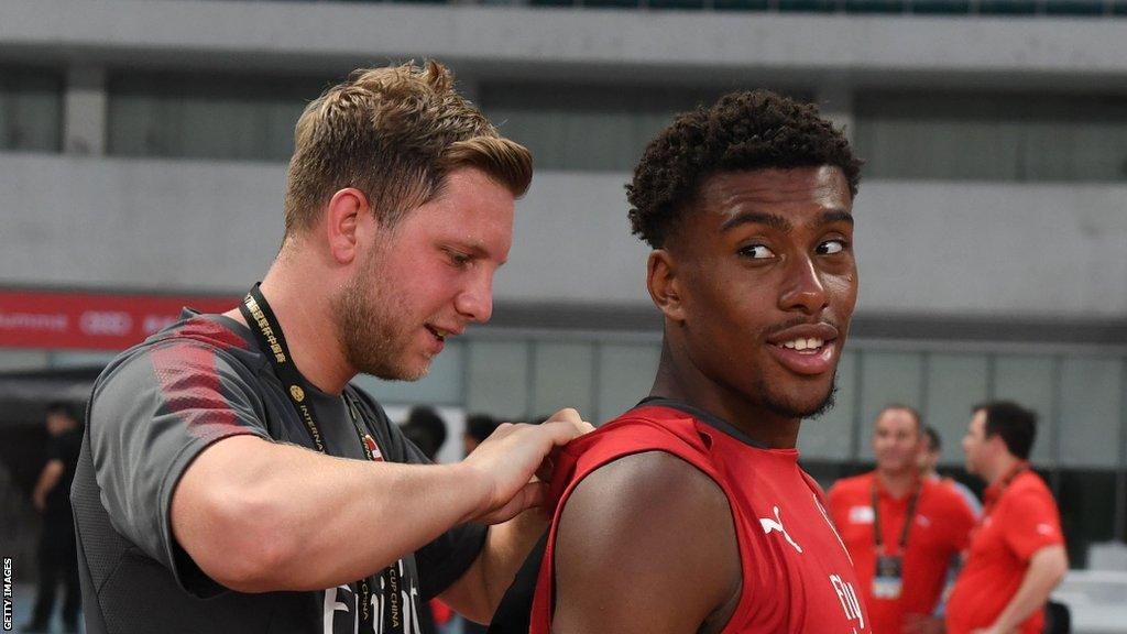 Arsenal analyst Ben Knapper (left) with Alex Iwobi before a training session in 2018