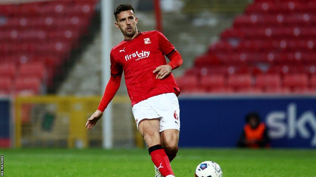 Mathieu Baudry playing for Swindon this season