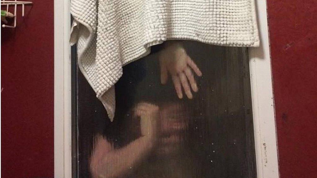 Liam Smith's date trapped upside down inside a window