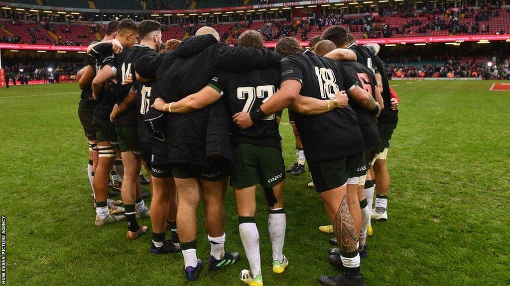 Wales players in a huddle after the 13-12 defeat against Georgia