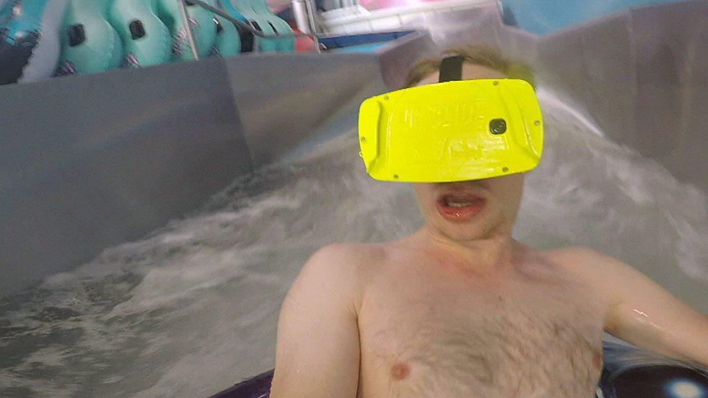 Going down a waterslide with VR glasses