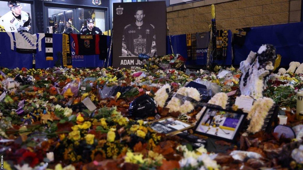 Floral tributes to Adam Johnson outside Nottingham's Motorpoint Arena