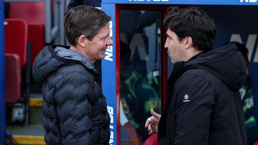 Oliver Glasner talks with Andoni Iraola