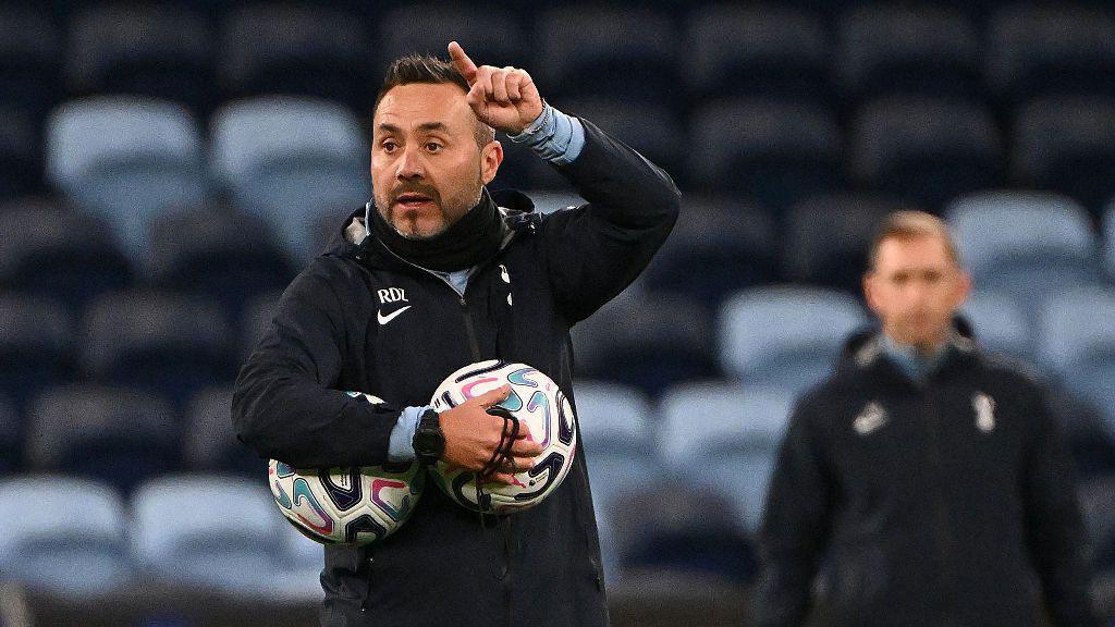Tottenham head coach Roberto de Zerbi gives instructions to his players