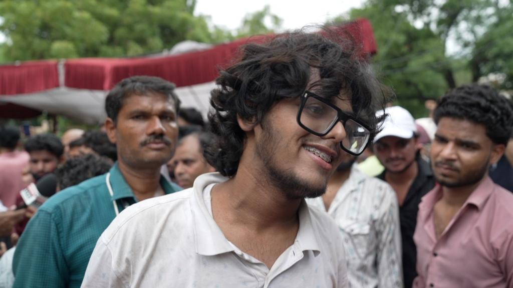 Protesters celebrate resignation of India's education minister