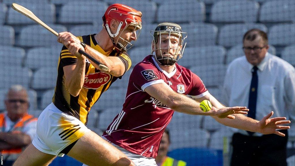 Cillian Buckley is about to fire in Kilkenny's winning goal at Croke Park despite the efforts of hurley-less Galway player Padraic Mannion