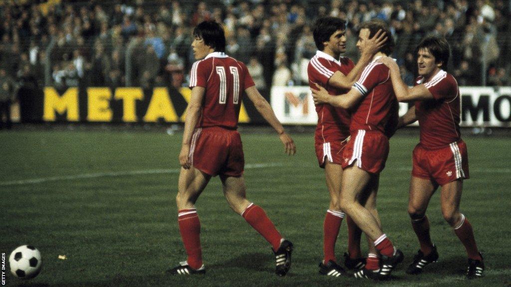 Eintracht Frankfurt's Cha Bum-kun, Werner Lorant, goalscorer Bernd Holzenbein and Bernd Nickel celebrate in the 1980 Uefa Cup final