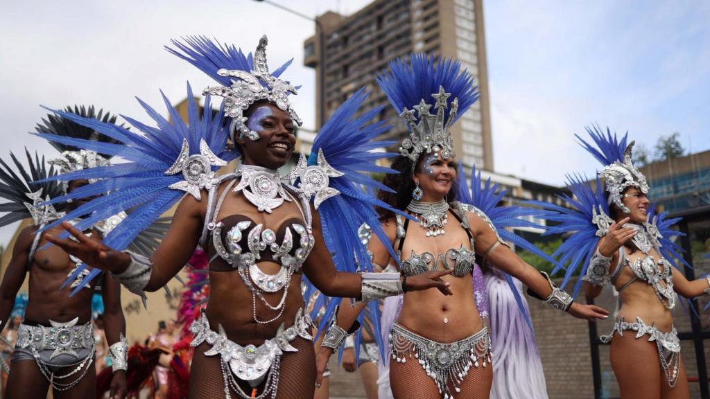 Performers in costumes take part in the Notting Hill Carnival in London, Britain, 28 August 2023