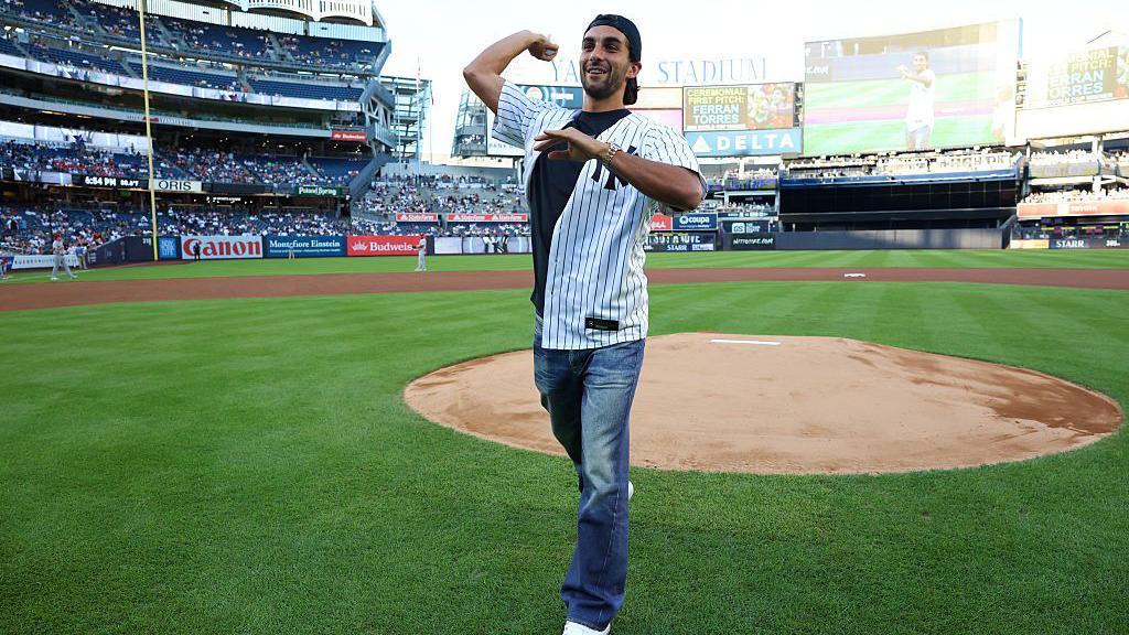 Ferran Torres throws the ceremonial first pitch before the New York Yankees' game against St Louis Cardinals