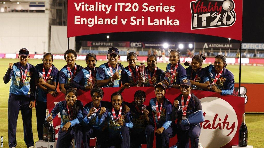 Sri Lanka celebrate with the T20 series trophy