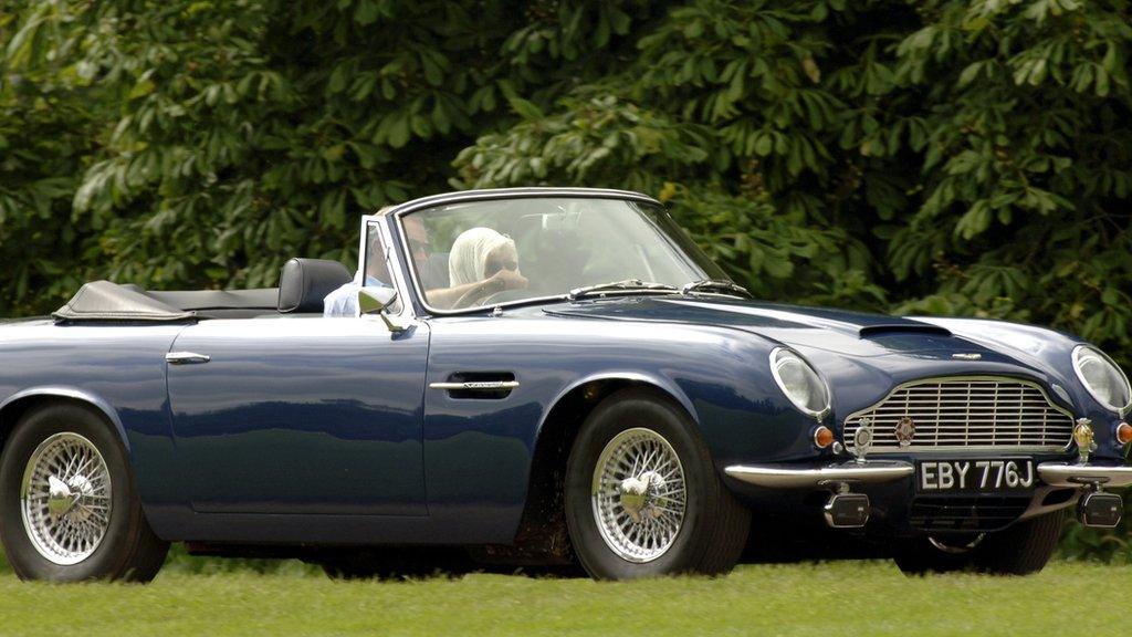 prince charles in his aston martin