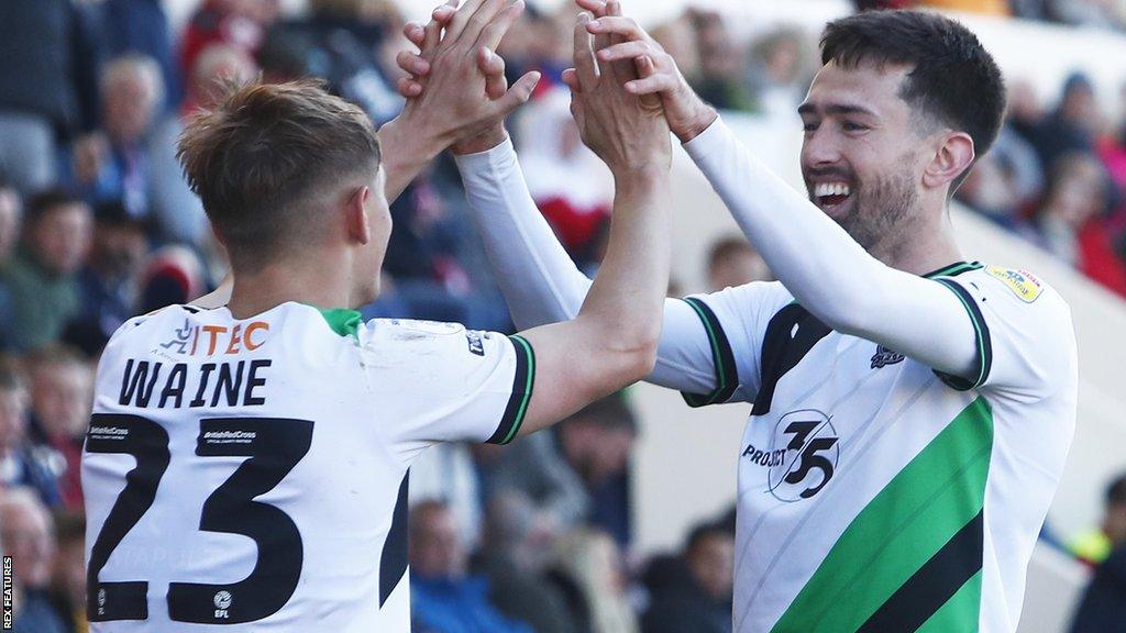 Ben Waine and Ryan Hardie celebrate a goal