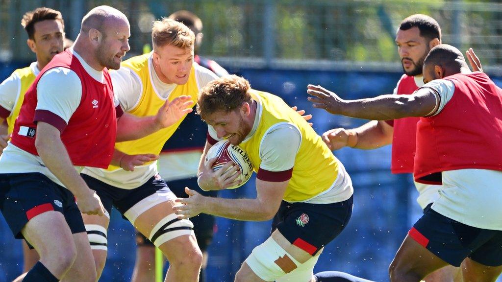 Ollie Chessum runs with the ball during an England training session at their Le Touquet base in France