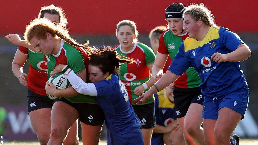 Clovers prop Niamh O’Dowd is tackled by Sian Jones in Sunday's game in Cork