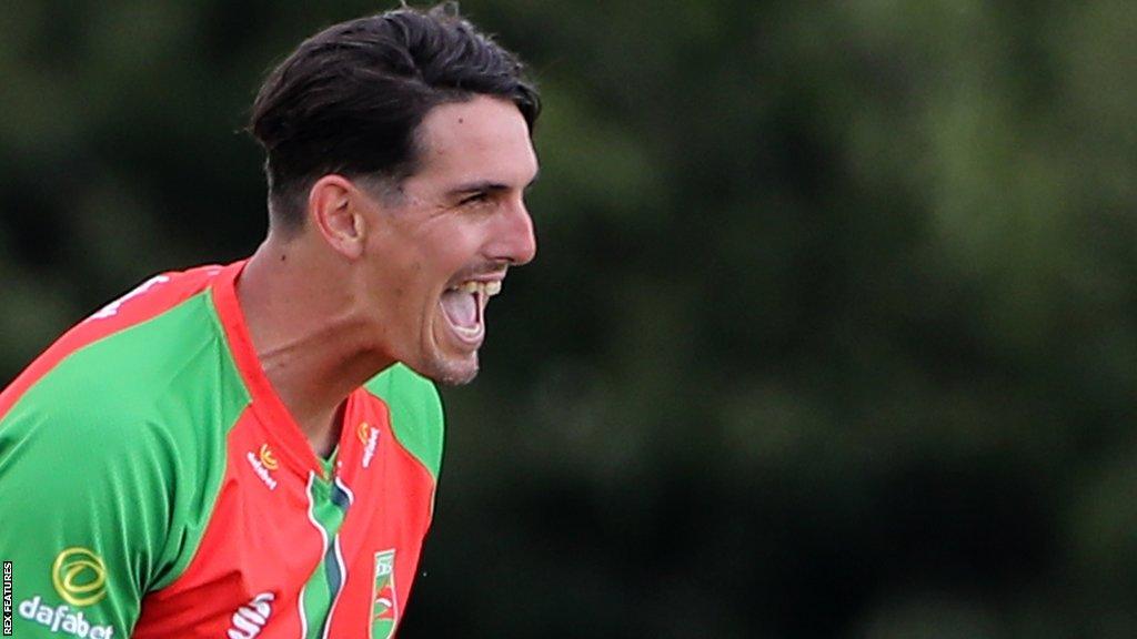 Chris Wright of Leicestershire celebrates taking a wicket