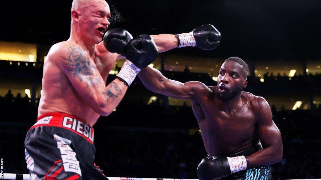 Lawrence Okolie lands a punch on his opponent