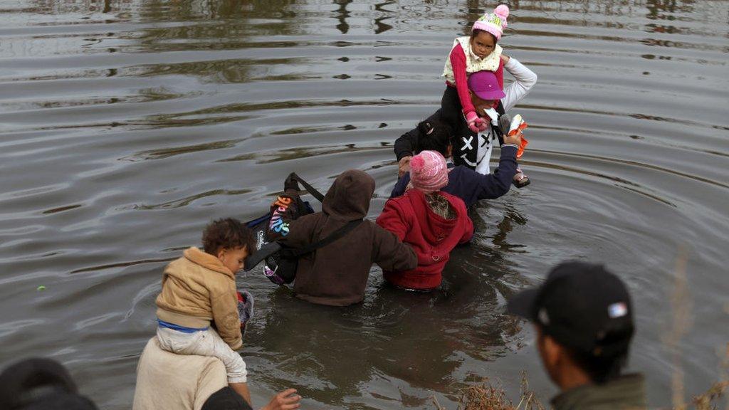 Migrants in the Rio Grande on 19 December