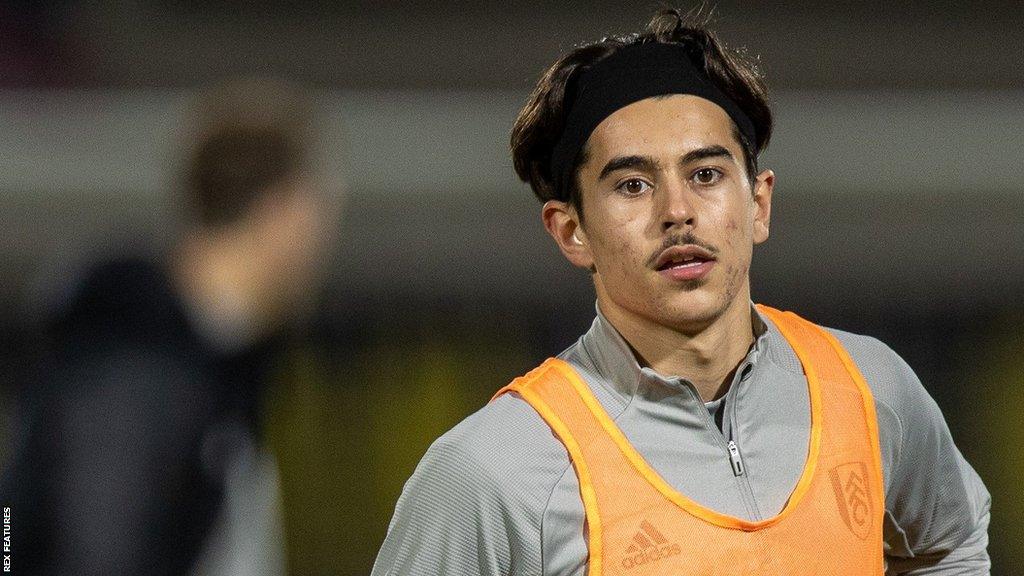 Ryan De Havilland warming up before a Fulham Academy game