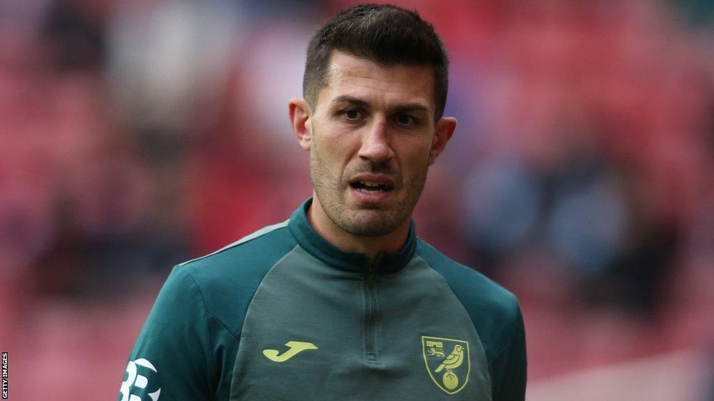 Norwich's Danny Batth warms up before a game