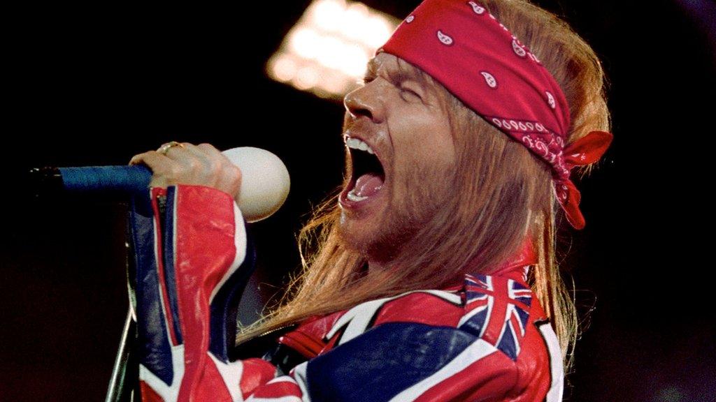 Axl Rose sings