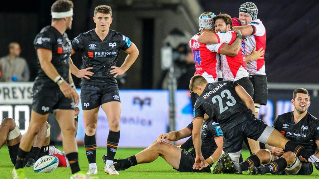 Ospreys are dejected in defeat as Lions celebrate their win