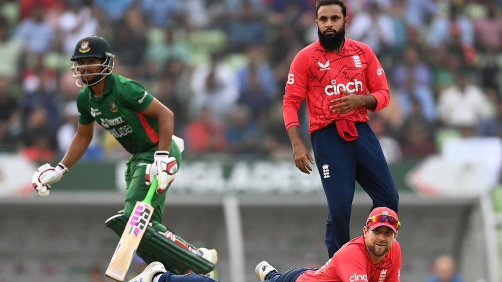 Adil Rashid and Dawid Malan watch as Najmul Hossain Shanto hits a boundary