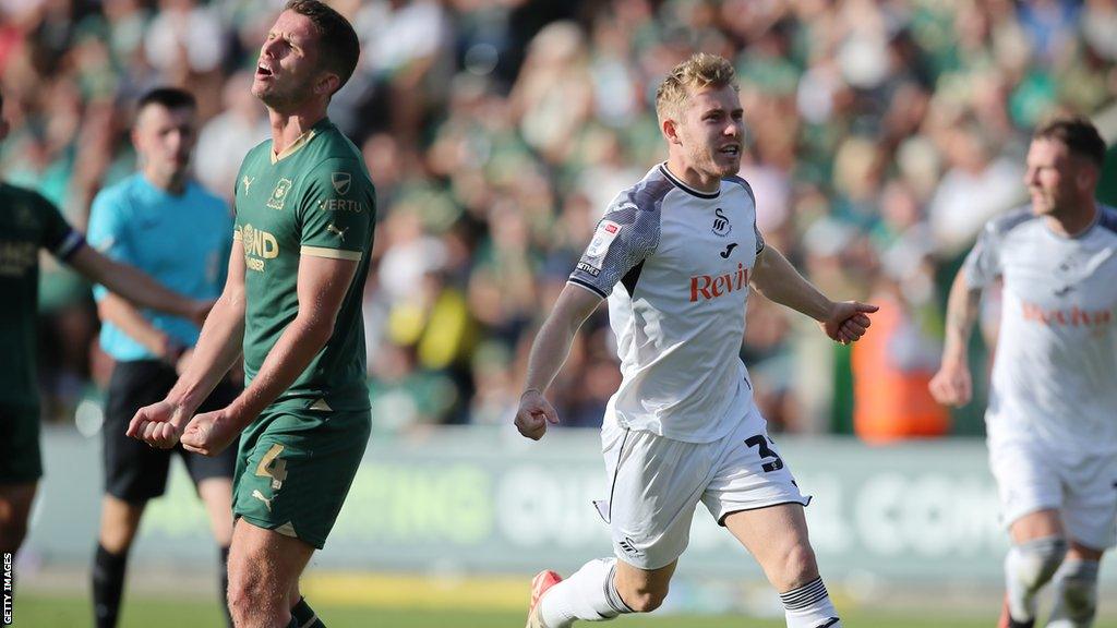 Swansea's Ollie Cooper celebrates after scoring with almost his first touch after coming off the bench