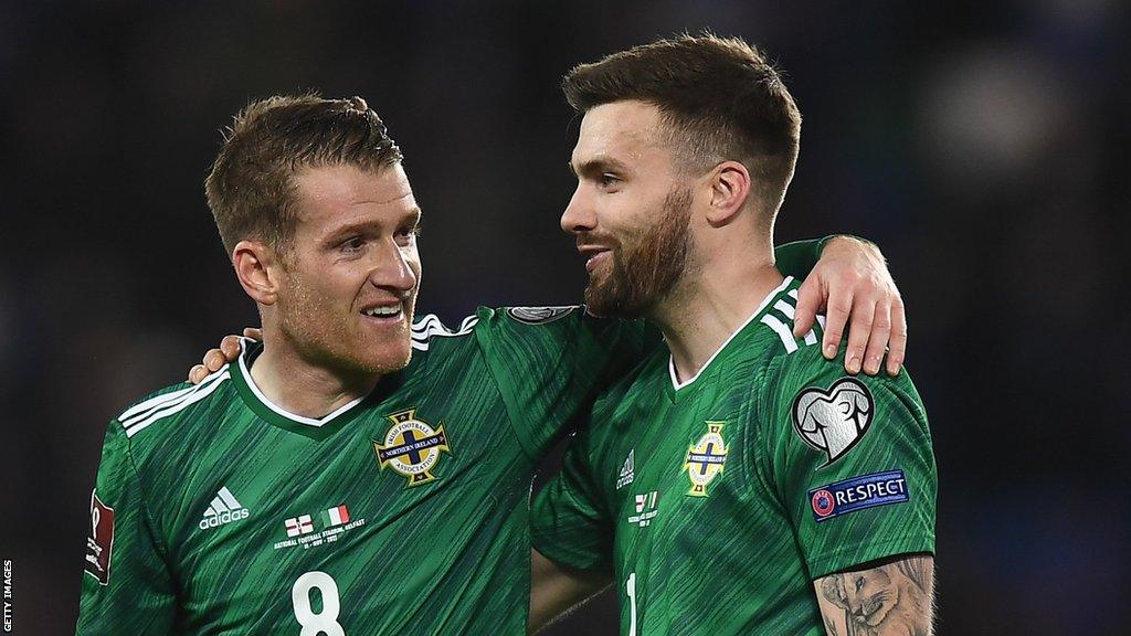 Steven Davis and Stuart Dallas pictured playing for Northern Ireland in 2021