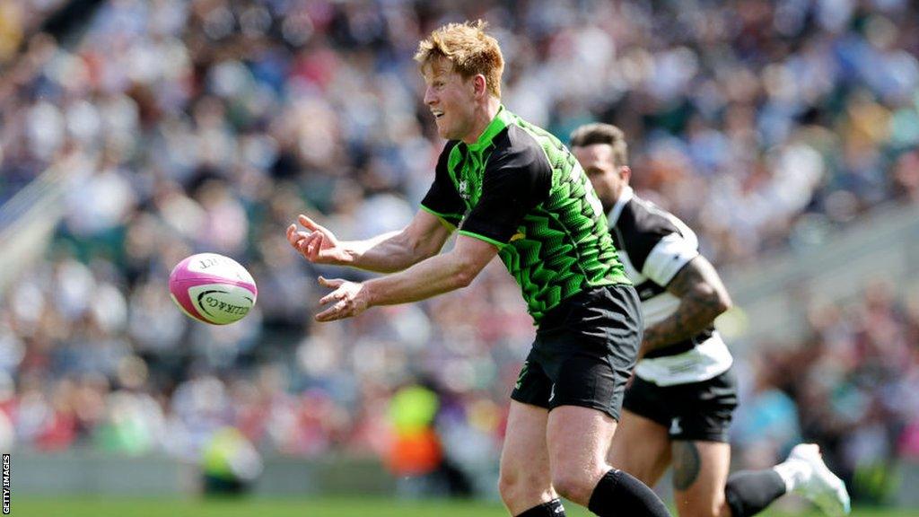 Rhys Patchell of World XV passes the ball during the Kilik Cup match between Barbarians and World XV at Twickenham Stadium