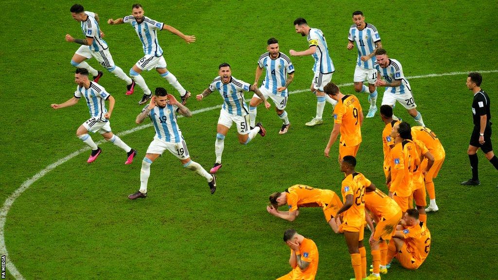 Argentina celebrate after they beat the Dutch in penalty shootout at the 2022 World Cup