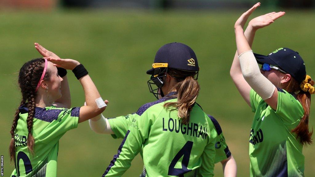 Aimee Maguire (left) celebrates taking a wicket for Ireland at the U19 T20 World Cup in South Africa in January