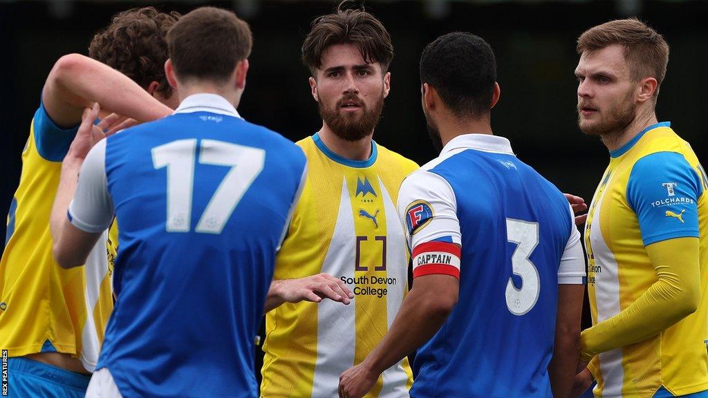 Torquay United players in action at Tonbridge Angels