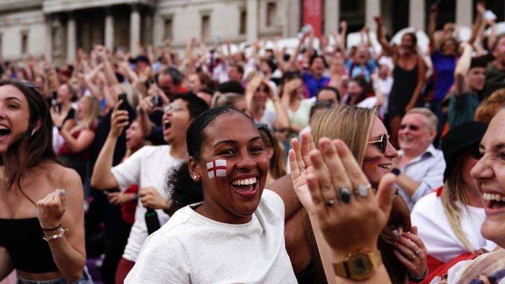 Fans celebrate England's historic win