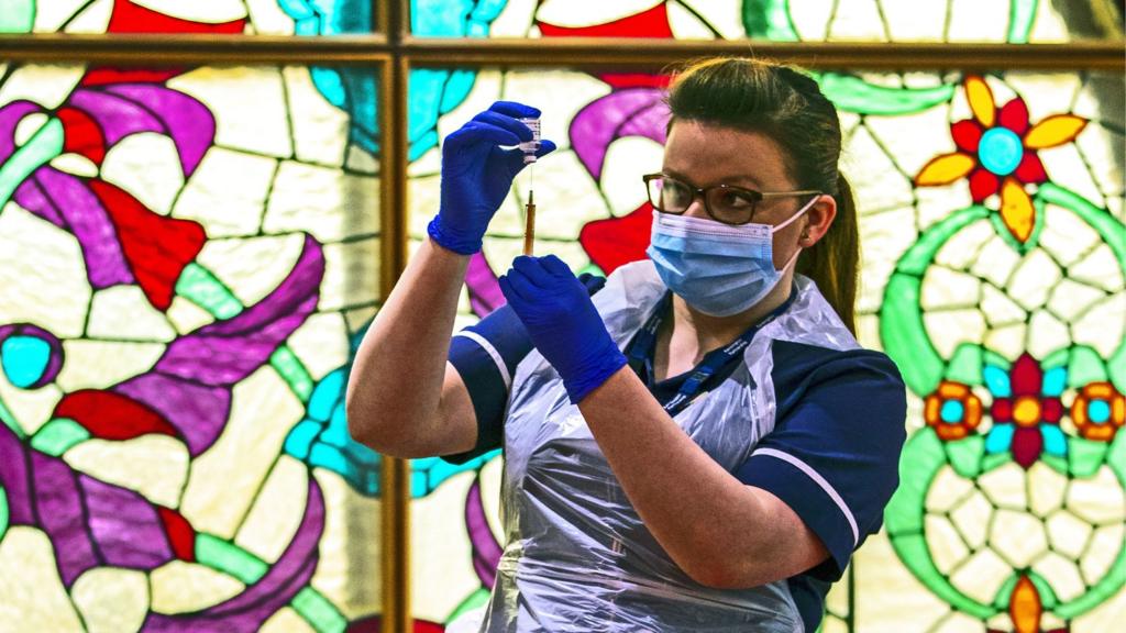 Nurse with jab in Bradford Central Mosque community vaccination centre