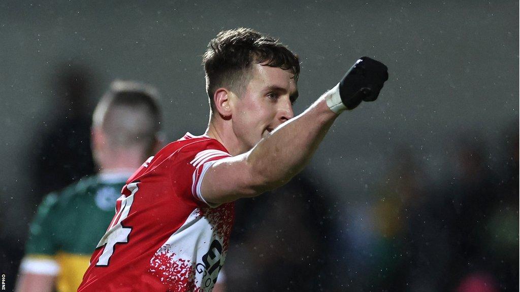 Derry forward Shane McGuigan celebrates kicking the winning free against Kerry on Saturday night