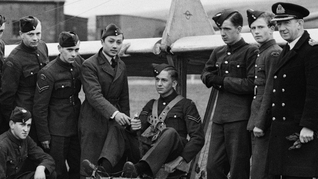 Prince Bira showing a glider pilot the controls