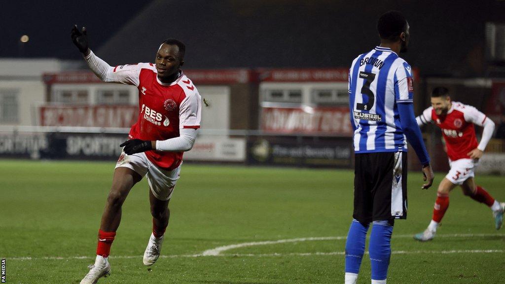 Carlos Mendes Gomes celebrates scoring for Fleetwood against Sheffield Wednesday