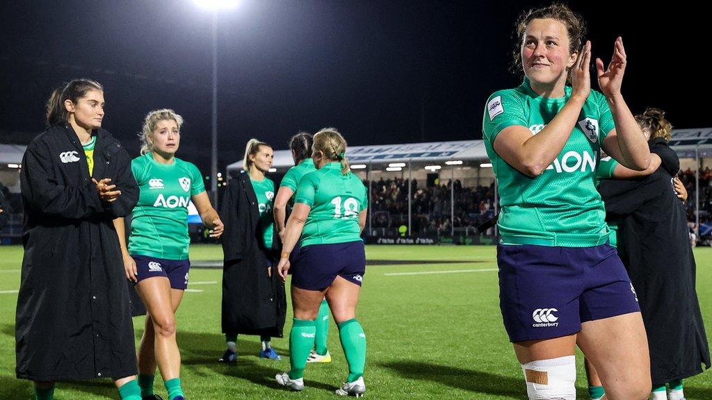 Ireland players applaud the fans after losing away to Scotland